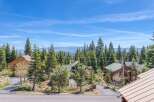 Nestled amidst towering trees and breathtaking mountain views, this property offers a serene escape.