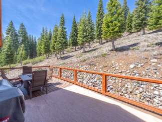 Enjoy breathtaking mountain views from this stunning deck! This property features a spacious outdoor area, perfect for entertaining or relaxing.