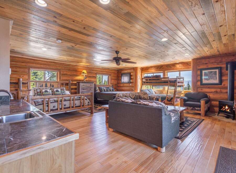 Experience rustic charm and modern comfort in this stunning log cabin.