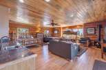 Experience rustic charm and modern comfort in this stunning log cabin.