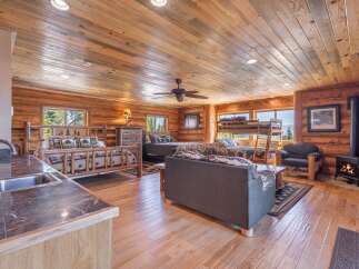 Experience rustic charm and modern comfort in this stunning log cabin.