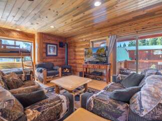 Step into rustic charm with this cozy cabin retreat.