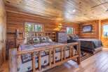 Step into rustic elegance in this stunning log cabin bedroom.