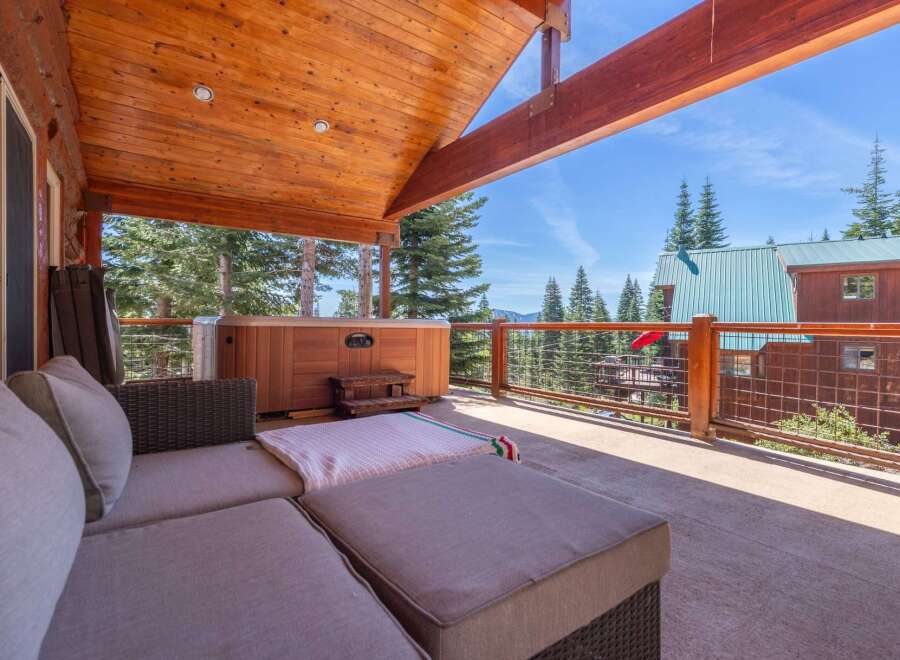 Enjoy the ultimate relaxation in this stunning outdoor space! This property features a luxurious hot tub, perfect for unwinding after a long day.