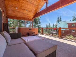 Enjoy the ultimate relaxation in this stunning outdoor space! This property features a luxurious hot tub, perfect for unwinding after a long day.