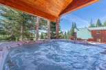 Relax and unwind in this luxurious hot tub, surrounded by the beauty of nature.