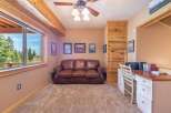 This cozy room features a comfortable leather sofa, perfect for relaxing.