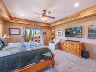 Step into a cozy bedroom retreat with rustic charm.