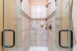 Step into a spa-like oasis with this stunning shower.