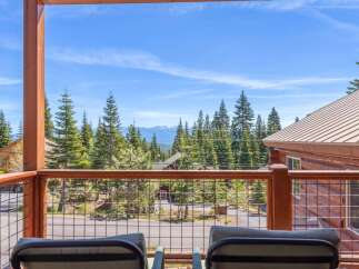 Enjoy breathtaking mountain views from this charming property.
