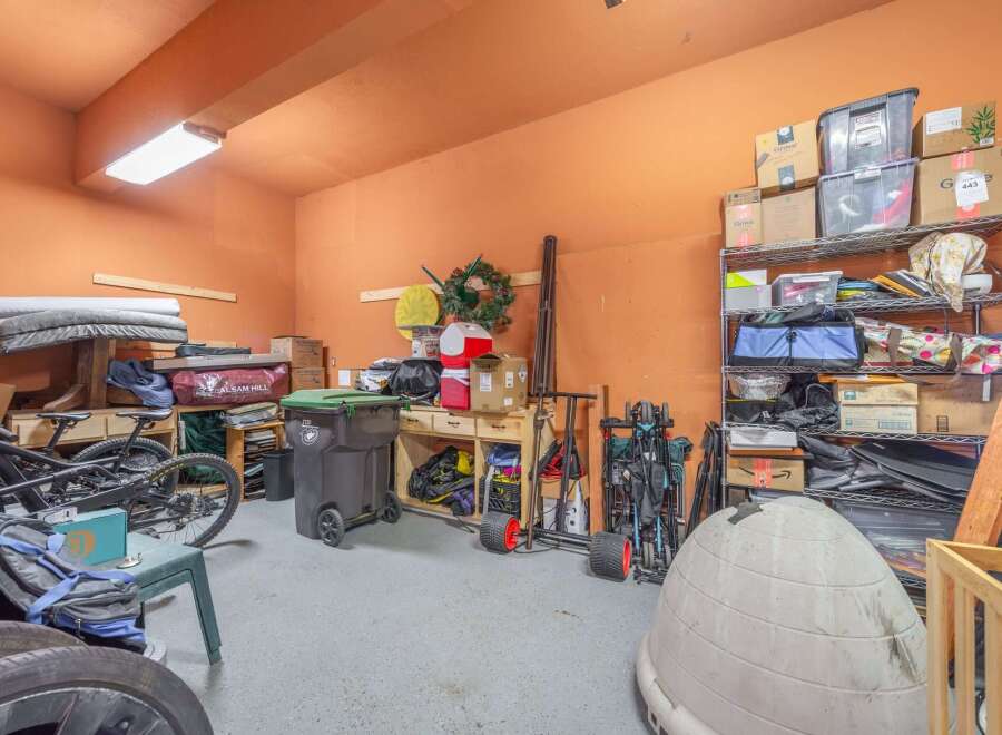This garage offers ample storage space, perfect for organizing tools, equipment, and seasonal items.