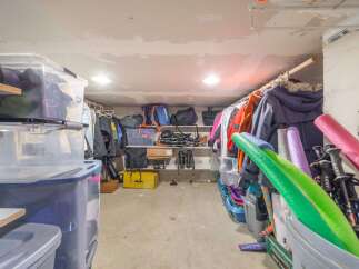 This storage space offers ample room for all your seasonal gear and equipment.