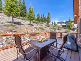 Enjoy the stunning mountain views from this luxurious outdoor deck.