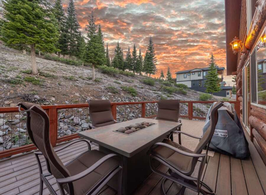 Enjoy breathtaking sunsets from this stunning outdoor deck, perfect for entertaining or relaxing.