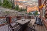 Enjoy breathtaking sunsets from this stunning outdoor deck, perfect for entertaining or relaxing.