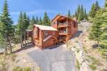 This stunning mountain home offers a luxurious retreat with its spacious design and breathtaking views.