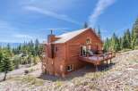 Nestled amidst the serene beauty of nature, this stunning property offers a perfect blend of rustic charm and modern comfort.