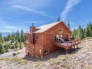 Nestled amidst the serene beauty of nature, this stunning property offers a perfect blend of rustic charm and modern comfort.