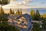 Experience breathtaking views from this stunning property! This home features a spacious deck, perfect for enjoying the serene surroundings.