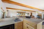 Discover luxury living at its finest with this stunning property, featuring a beautifully designed bar area.