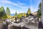 Enjoy breathtaking views from this stunning property! This home features a spacious deck perfect for outdoor dining and relaxation.