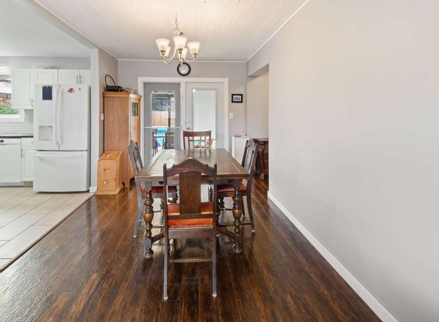Step into this inviting dining area, perfect for family gatherings and entertaining.