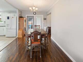 Step into this inviting dining area, perfect for family gatherings and entertaining.
