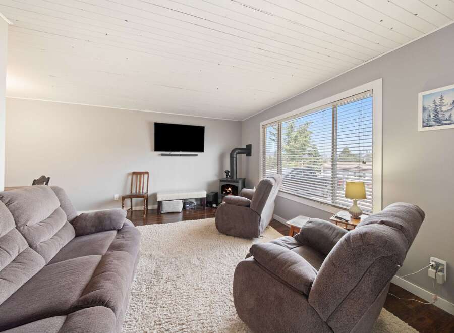 Step into this inviting living room, perfect for relaxation and entertaining.