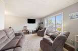 Step into this inviting living room, perfect for relaxation and entertaining.