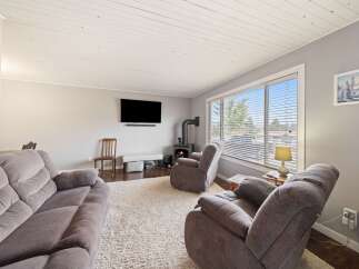 Step into this inviting living room, perfect for relaxation and entertaining.