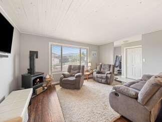 Step into comfort and style in this inviting living room.