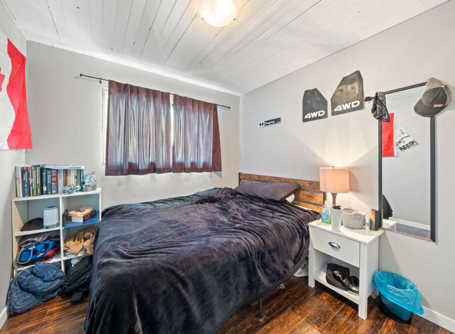 Cozy bedroom with a comfortable bed, perfect for relaxation.