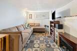 Discover the comfort of this inviting living space, perfect for relaxation and entertainment.