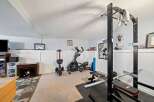 This home gym offers a dedicated space for fitness enthusiasts.