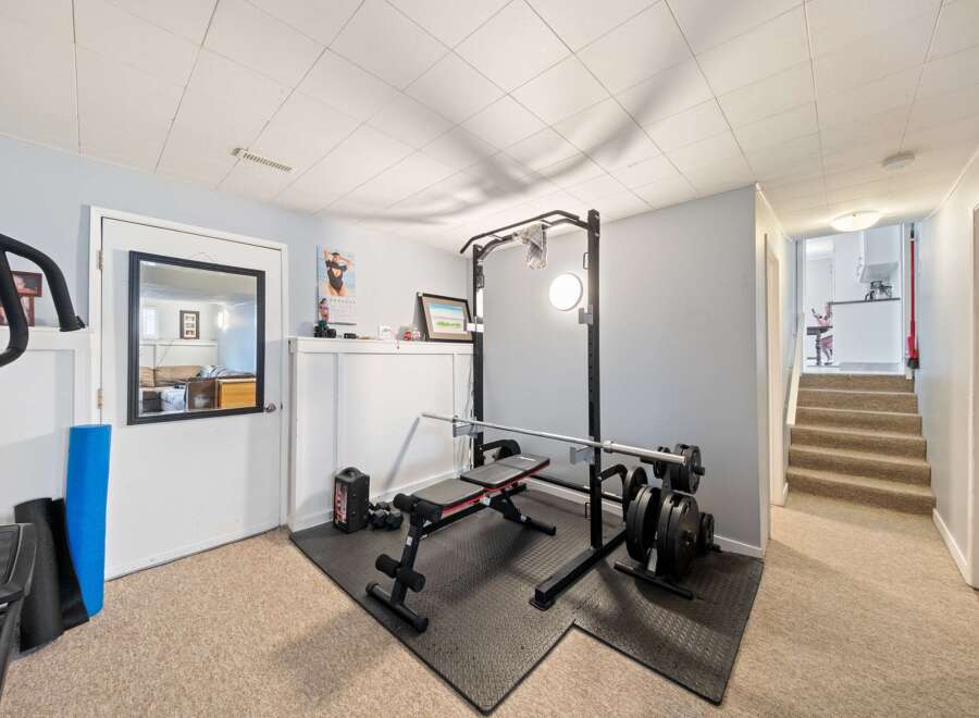 This home gym offers a dedicated space for fitness enthusiasts.