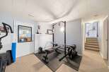 This home gym offers a dedicated space for fitness enthusiasts.