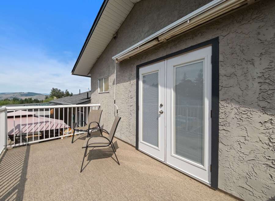 Enjoy the tranquility of this beautiful outdoor space! This property features a spacious deck, perfect for relaxing or entertaining.