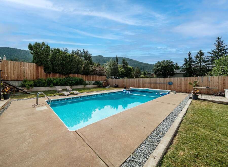 Enjoy the ultimate outdoor oasis with this stunning property featuring a sparkling swimming pool.