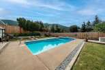Enjoy the ultimate outdoor oasis with this stunning property featuring a sparkling swimming pool.