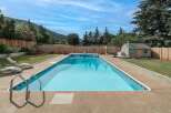 Enjoy the ultimate outdoor oasis with this stunning property featuring a sparkling swimming pool.