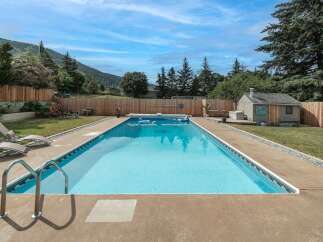 Enjoy the ultimate outdoor oasis with this stunning property featuring a sparkling swimming pool.