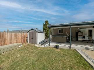Enjoy outdoor living at its finest with this property's inviting backyard.