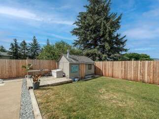 Enjoy outdoor living at its finest with this property's inviting backyard.