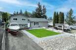 This charming property boasts a well-maintained exterior with a modern aesthetic.