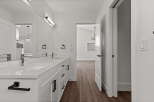 Step into a modern bathroom with sleek design and functional elegance.