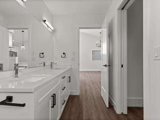 Step into a modern bathroom with sleek design and functional elegance.