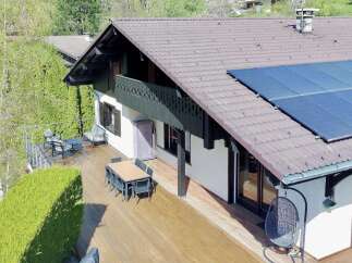 This stunning property boasts a modern design with a touch of rustic charm.