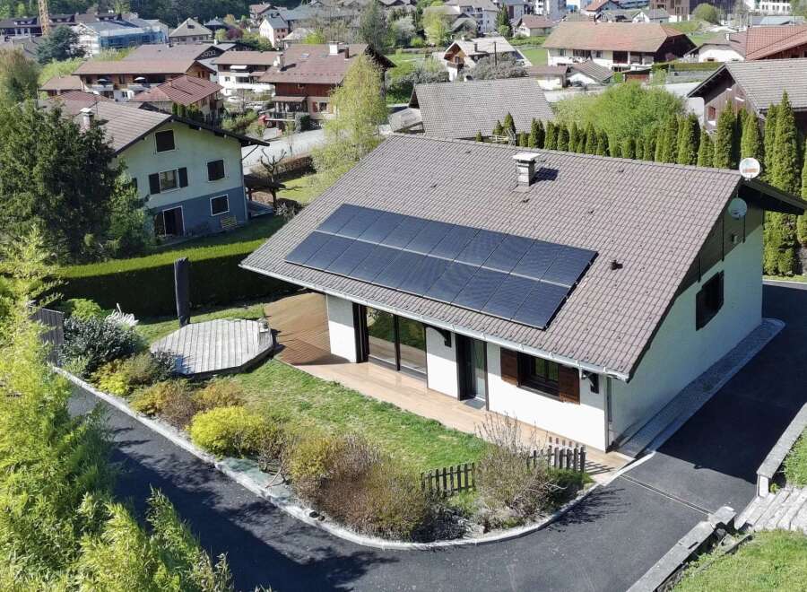 Discover this charming home featuring modern solar panels, offering both energy efficiency and a contemporary aesthetic.