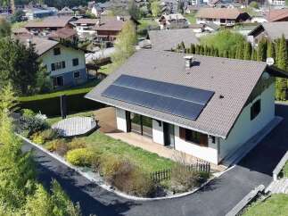 Discover this charming home featuring modern solar panels, offering both energy efficiency and a contemporary aesthetic.