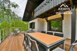 Enjoy breathtaking views from this stunning property featuring a spacious deck and a stylish dining area.